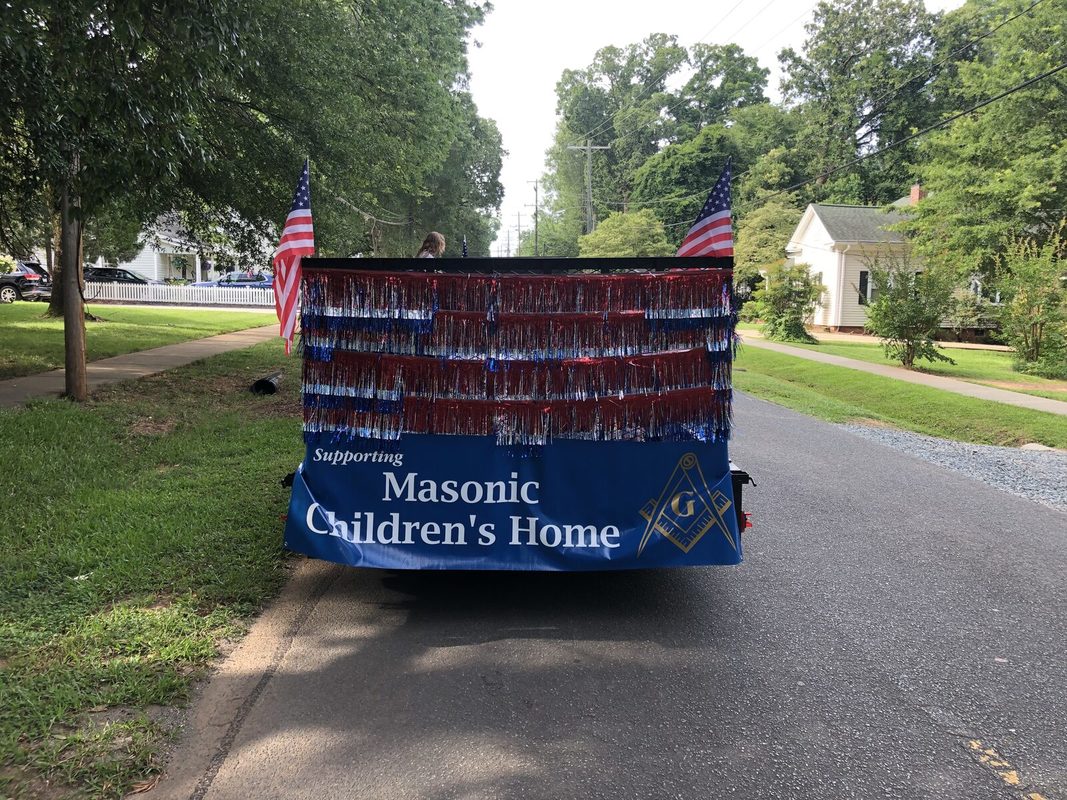 The lodge's float for the Masonic Children's Home in the Waxhaw Fourth of July parade