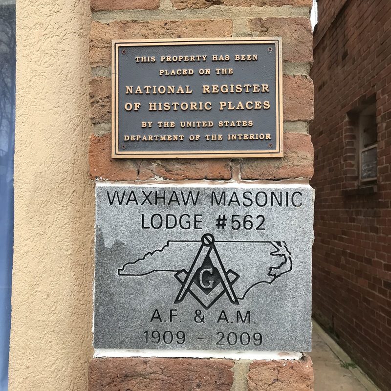 National Register of Historic Places plaque above the Waxhaw Masonic Lodge No. 562 stone, marked 1909 to 2009